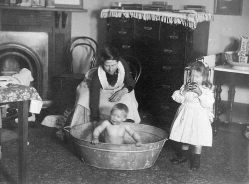 Bathing the baby, 1889