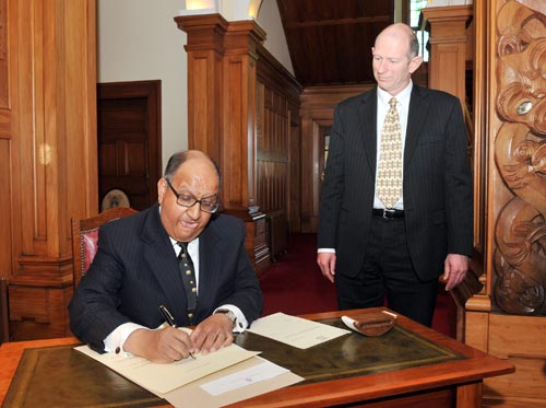 Governor-general signing the writ for an election