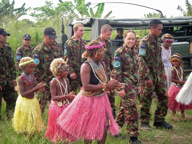 New Zealand soldiers and Solomon Islanders