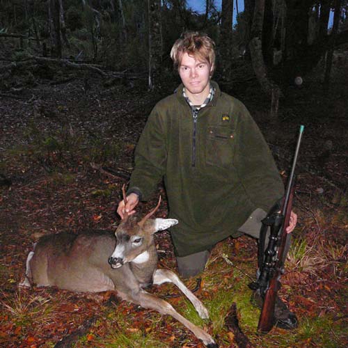 Hunter with deer 