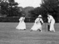 Women playing cricket