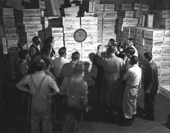 Playing darts at a factory, 1947