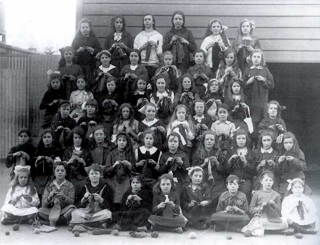 Schoolgirls knitting for the war, 1917