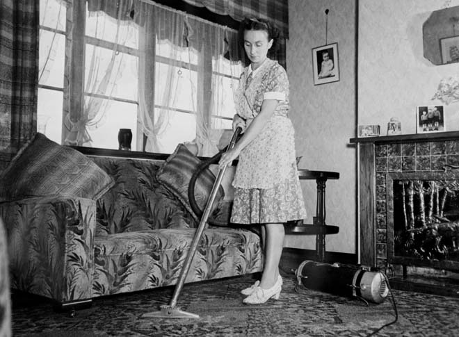 Mrs Evans vacuuming, 1947