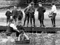 Boys playing in the river, Dunedin, 1894