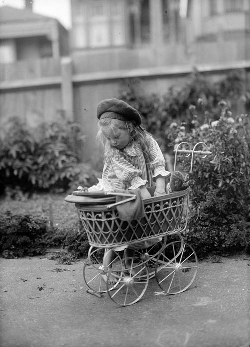 Doreen Gifford with her toy pram, around 1906