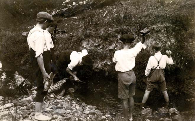 Boys on an eeling expedition, around 1910