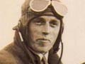 Oscar Garden astride his De Havilland 60 Gipsy Moth, England, 1930