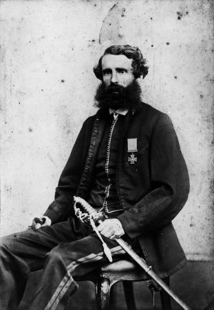 Photograph of Charles Heaphy seated with Victoria Cross medal on his chest