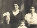 Fanny McHugh (standing, centre) with her daughter Gladys (right), mother Margaret (left) and baby granddaughter Frances