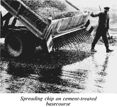 Laying cement-treated basecourse