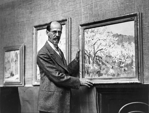 Sydney Lough Thompson with one of his paintings