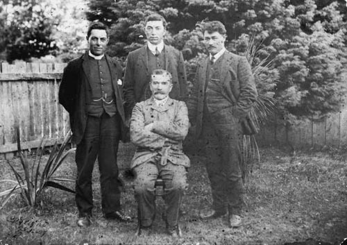 William Baucke (seated) with, from left, Frederick Bennett, Peter Buck and Tai Mitchell, 1907