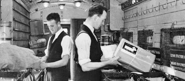 Sorting mail in a railway carriage, 1930s