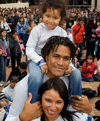 All Black rugby player Rodney So'oialo, his wife Marilyn and their child