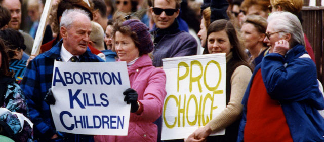 Anti-abortion and pro-choice protesters