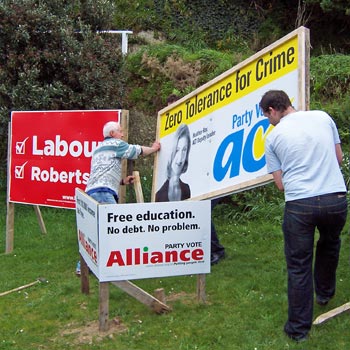 Party volunteers putting up election signs, 2008