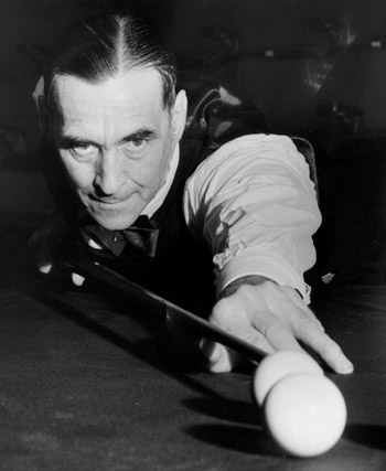 Clark McConachy playing billiards, 1951