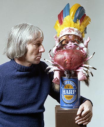Sculptor Don Driver with one of his assemblage sculptures, 1979