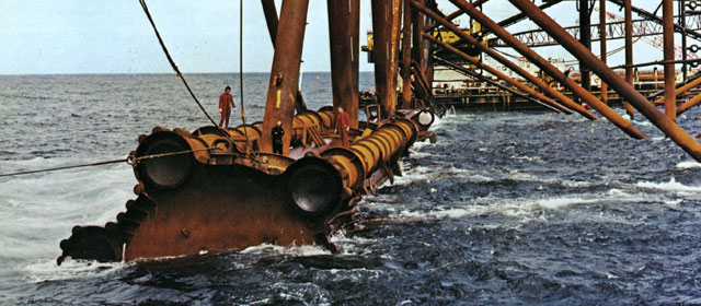 Māui A oil-drilling platform about to be raised upright and attached to the seabed