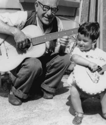 Agisilaos Cacaviatos and his grandson playing musical instruments, 1964