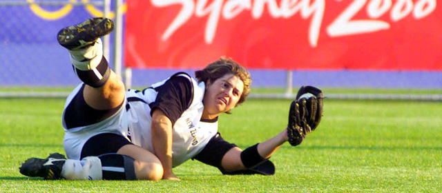 Kim Dermott takes a catch for the New Zealand softball team, Sydney Olympics, 2000