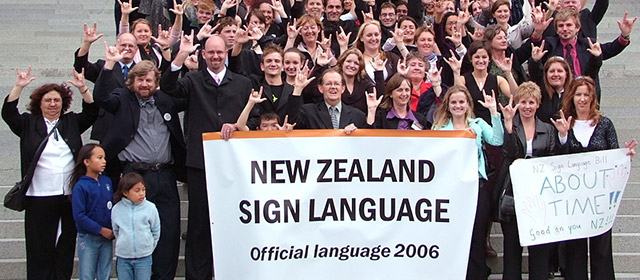 The passing of the 2006 New Zealand Sign Language Act was celebrated by supporters on the steps of Parliament.
