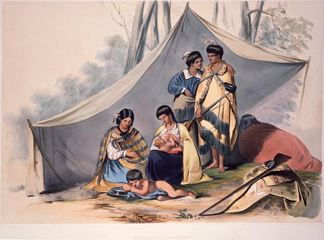 Māori mother breastfeeding