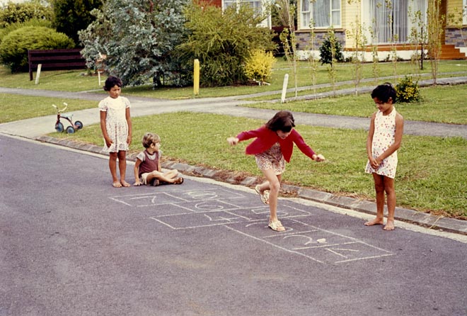 Girls playing hopscotch, around 1970