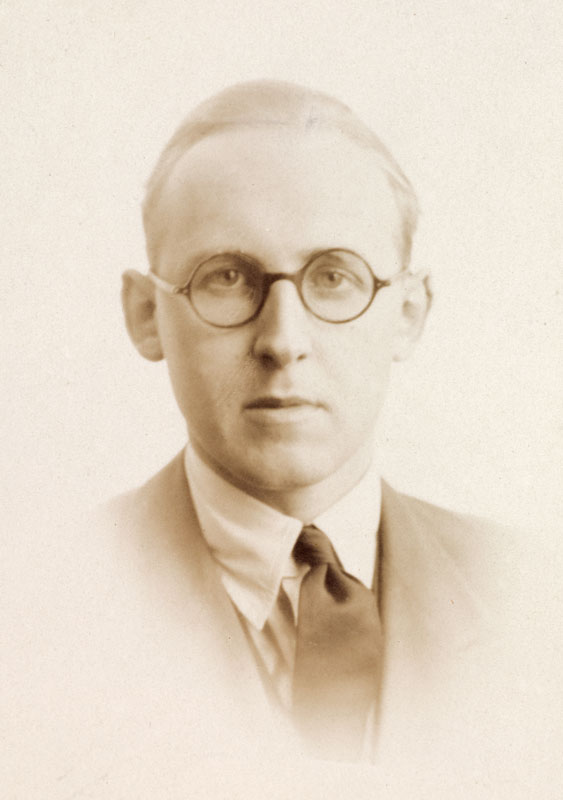 Sepia-coloured passport photograph of novelist James Courage