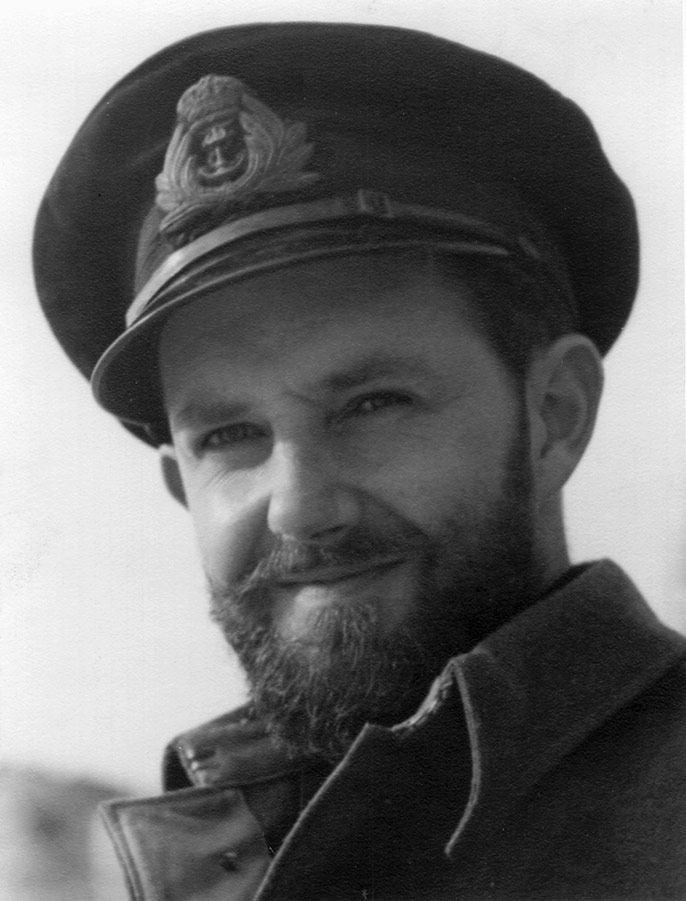 Owen Woodhouse as a young man, bearded, in a naval uniform and cap.