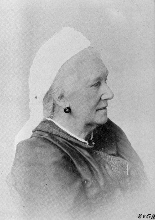 A black and white studio portrait of Mary Muller as an older woman, seated and in profile.
