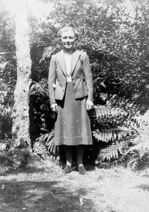 Noeline Baker in her garden at Moturau Moana, Stewart Island, about 1953