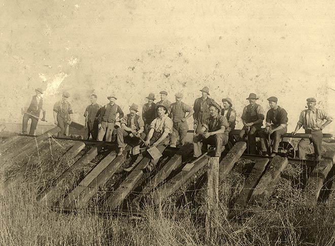 Arthur Cook and Richard Eddy working on a railway line