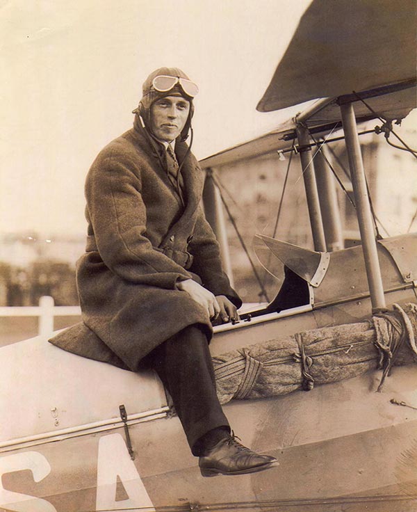 Oscar Garden astride his De Havilland 60 Gipsy Moth, England, 1930