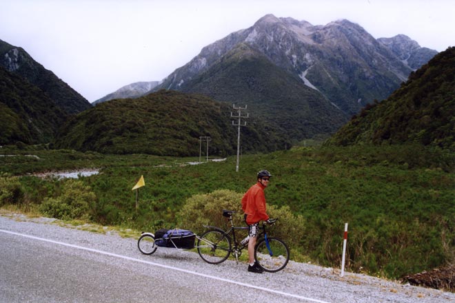 Mountain bike tourist with trailer