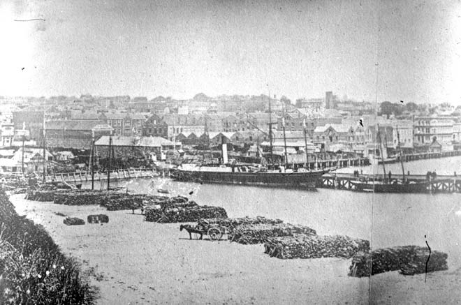 Timber at Auckland wharves, late 1860s