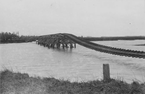 Flood-damaged bridge, Clive, 1897
