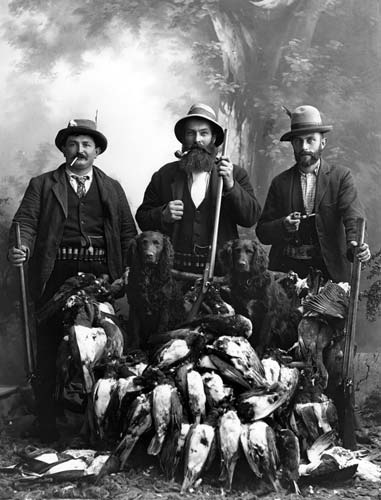 Hunters with kererū