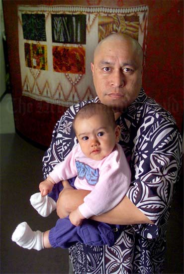 Mua Strickson-Pua and his granddaughter