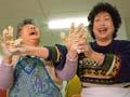 Women making dumplings at the Chinese Anglican Church Bazzar