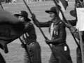 Girl Guides marching 