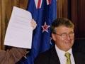 Helen Clark and Jim Anderton with their coalition agreement, 1999