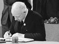 Peter Fraser signing the United Nations Charter, 1945