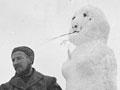 Coast-watchers with snowwoman, Auckland Islands, 1942