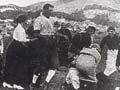 Women playing men's rugby team 