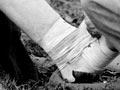 Volunteer doctor at rugby test, 1950