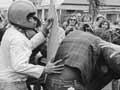 Protestors and rugby fans in conflict, 1981