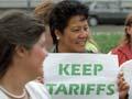 Protesting against tariff cuts