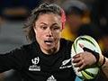 New Zealand women's rugby player Ruby Tui trying to evade Australian opponents during 2021 rugby world cup game.
